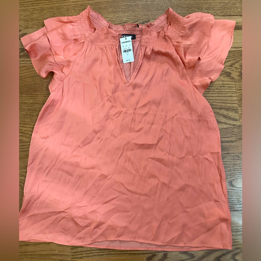 WOMEN’S EXPRESS TOP